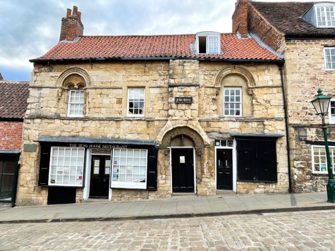 Three black doors, Jews House, Lincoln, July 2023