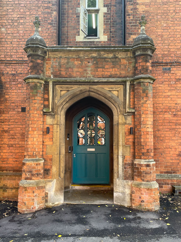 Grand entrance and interesting glass panelled door, Lincoln, July 2023