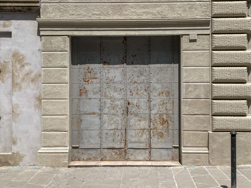 Austere iron doors, Todi, Umbria, Italy, July 2023