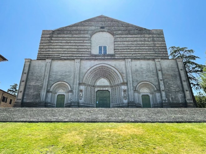 Three front doors of Chiesa di San Fortunato, Todi, Umbria, Italy, July 2023