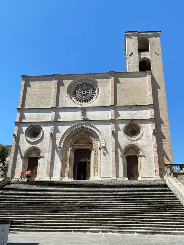 Three fine entrances and doors on the Duomo di Todi, Todi, Umbria, Italy, July 2023