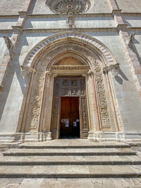 Central door of the Duomo di Todi, Todi, Umbria, Italy, July 2023
