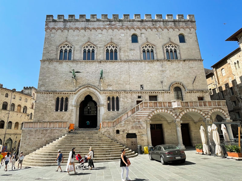 Palazzo dei Priori with several doors and entrances, Perugia, Umbria, Italy, July 2023