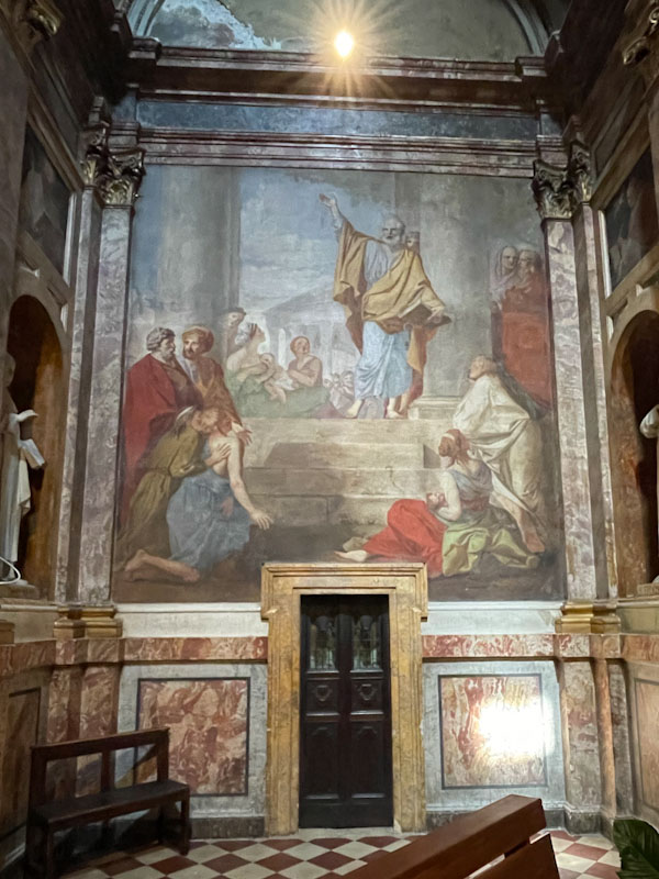 Inside church doors and fresco, Perugia, Umbria, Italy, July 2023