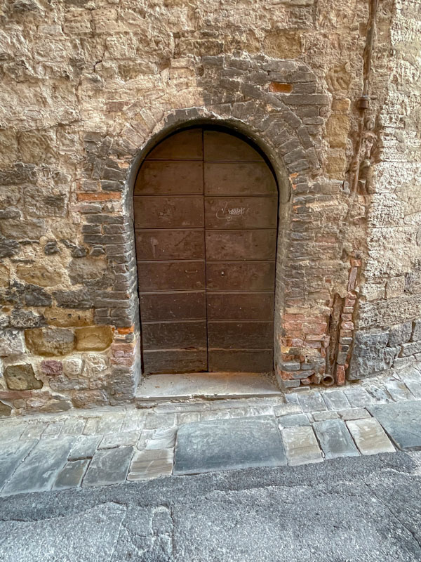 Plain door - plane arch, Perugia, Umbria, Italy, July 2023
