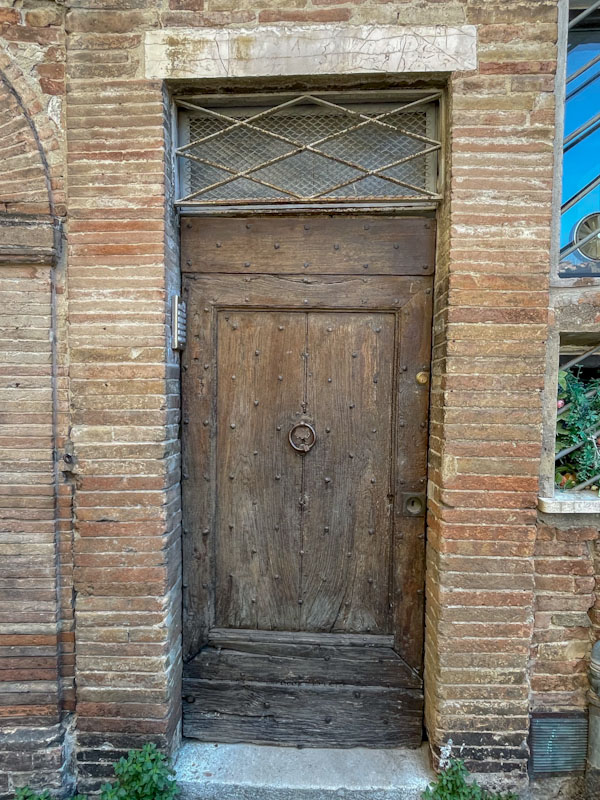Lovely old wooden door, Perugia, Umbria, Italy, July 2023