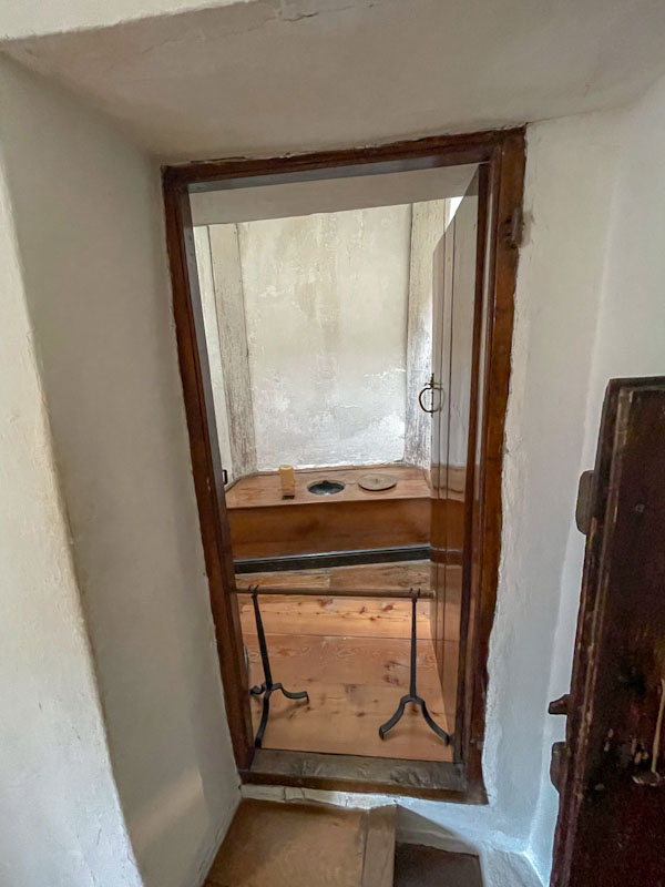 Door to the 'smallest room', Cotehele, Cornwall, August 2023