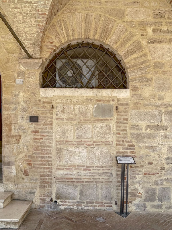 Ghost door and AC unit, Montefalco, Umbria, Italy, July 2023