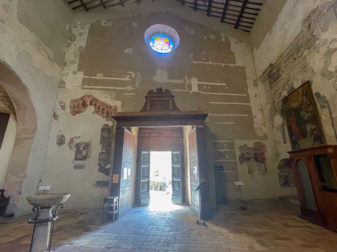 Entrance doors to the church of Saint Agostino, Montefalco, Umbria, Italy, July 2024