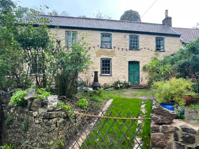 Cottage and green door, Cheddar Gorge, Somerset, October 2023