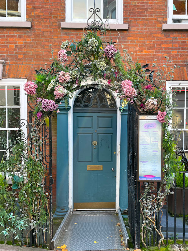 Door with floral gateway, Nottingham, November 2023