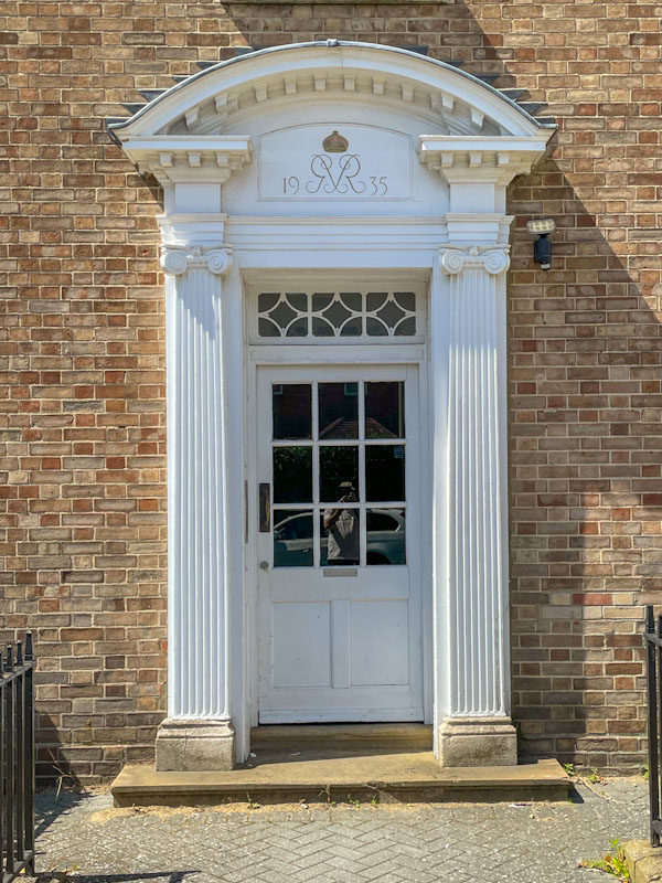 Splendid white door and surround plus untintional doorfie, Cheltenham, July 2023