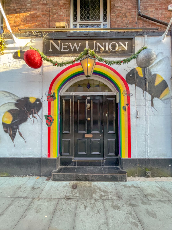 New Union pub door, Gay Village, Manchester, November 2023