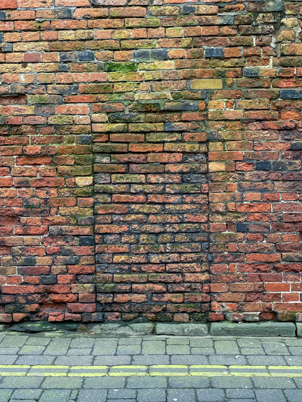 Ghost door in a brick wall, Nottingham, March 2024