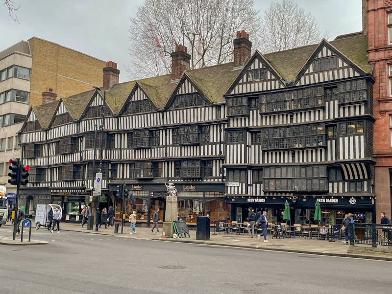 Multiple doors and shop frontage, Staple Inn, High Holborn, London, March 2024
