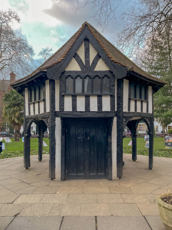 Gardener's hut (1925) and black door, Soho Square, London, March 2024