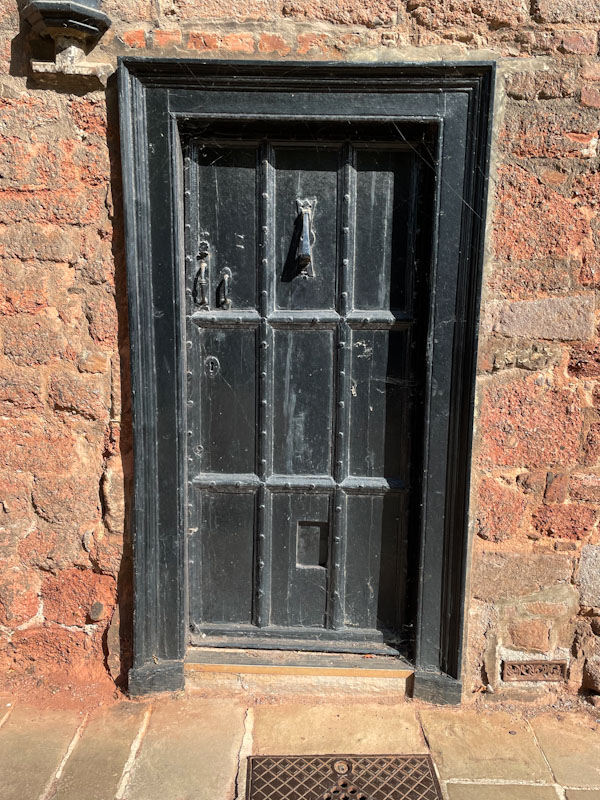 Black door with plenty of features to enjoy, Exeter, October 2024