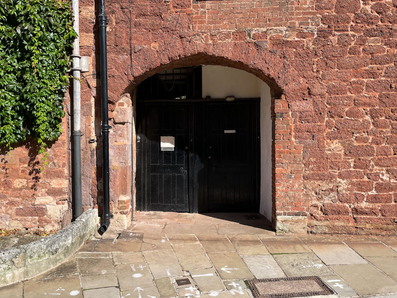 Two doors set back in a recess, Exeter, October 2024