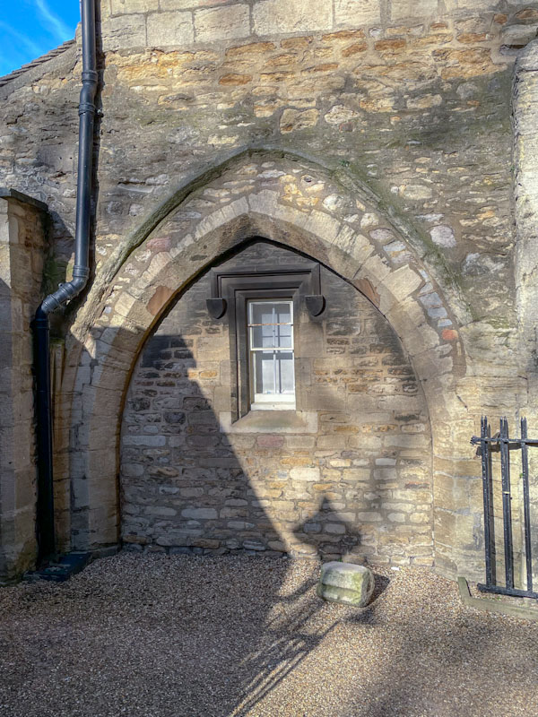 Ghost door or gateway, now with nicely framed window, Peterborough, Cambridgeshire, April 2024