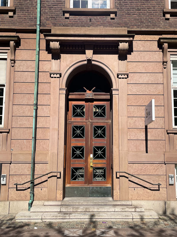 Large double doors with ironwrok window panels, Vestervold, Copenhagen, Denmark, September 2025