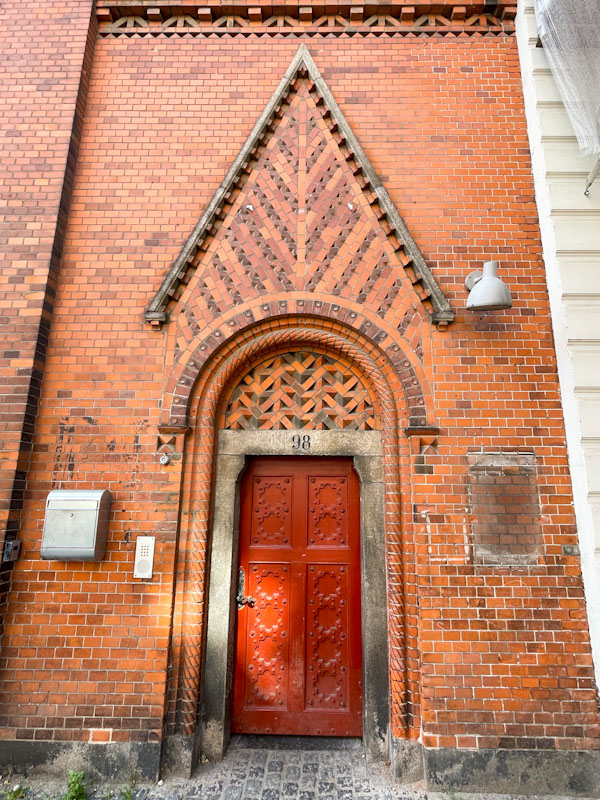Beautiful red doors and brick surround, Galerie Ellen Frilling, Copenhagen, Denmark, September 2025