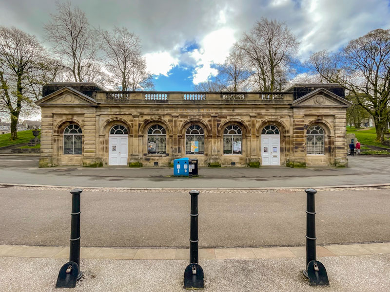 White doors of the Buxton pump room, Buxton, Derbyshire, April 2024