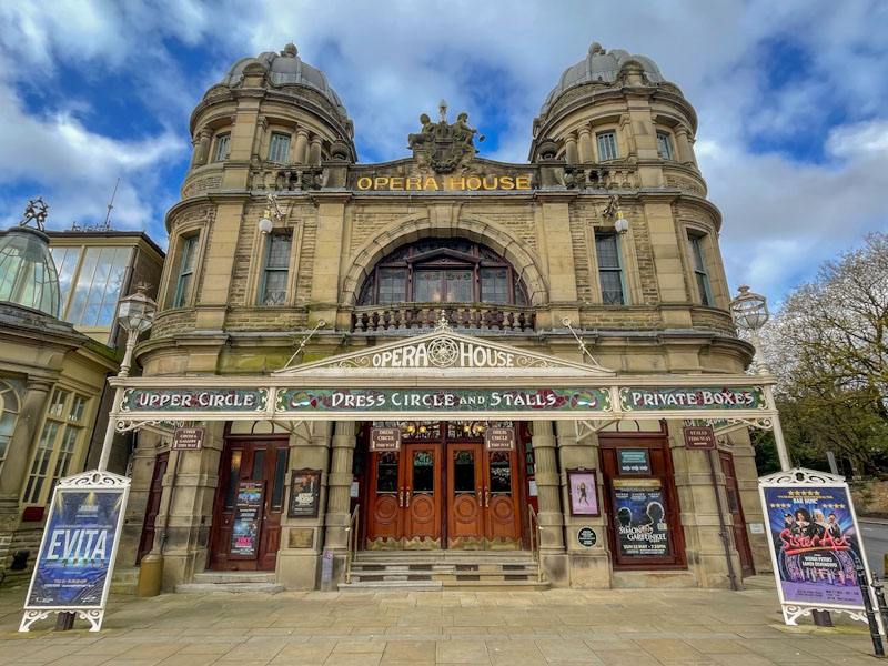 Two double doors and side entrances to the Buxton Opera House, Buxton, Derbyshire, April 2024