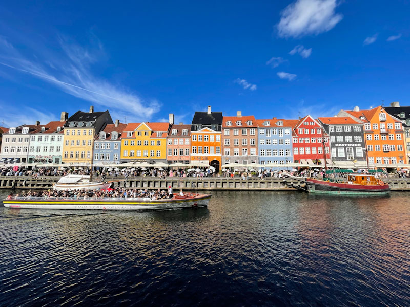 Iconic view and many doors of the waterside, Nyhavn, Copenhagen, Denmark, September 2024