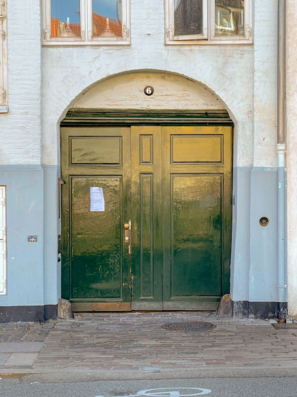 Large arched door, Nyhavn, Copenhagen, Denmark, September 2024