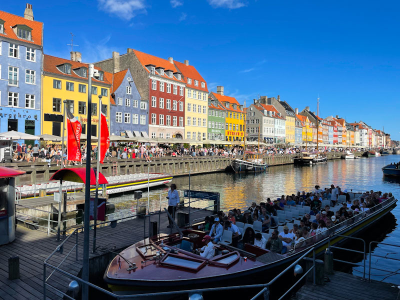 Iconic view and many doors of the waterside, Nyhavn, Copenhagen, Denmark, September 2024
