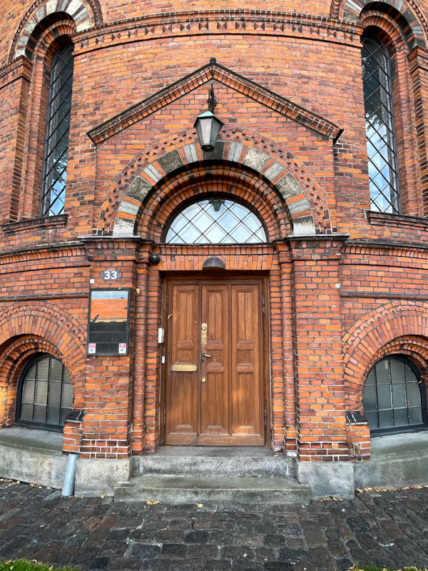 Three-panelled double doors on St Paul's church, Gernersgade, Copenhagen, Denmark, September 2024