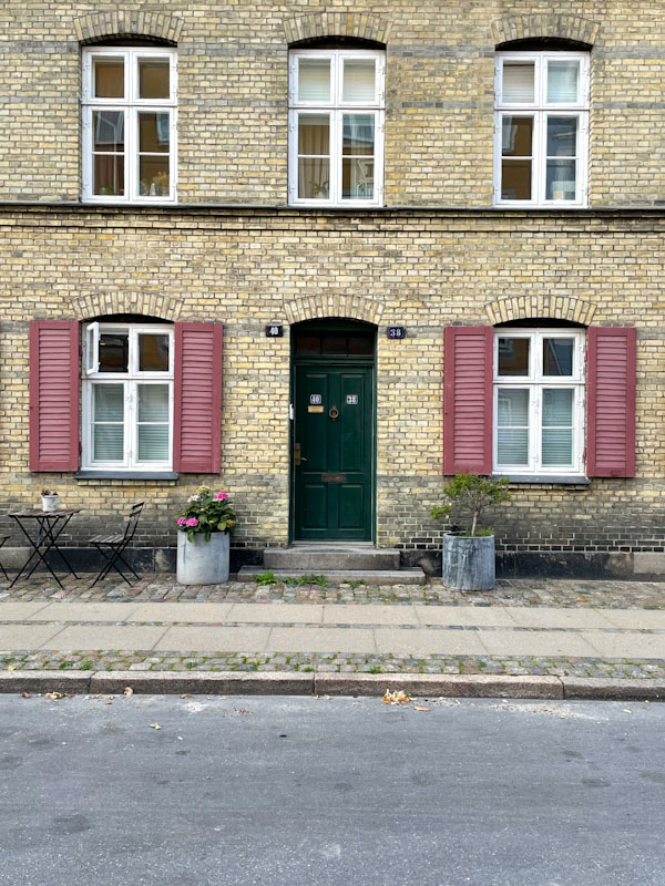 A simple symmetry of doors windows and shutters, Gernersgade, Copenhagen, Denmark, September 2024
