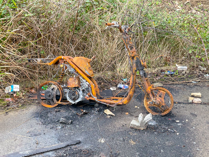 Rusty, burnt out scooter, Lawrence Weston, Bristol, February 2025