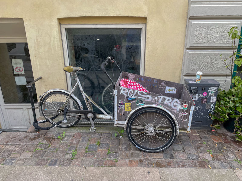 Just about a door as an excuse to show the common mode of transport in the city, Vendersgade, Copenhagen, Denmark, September 2024