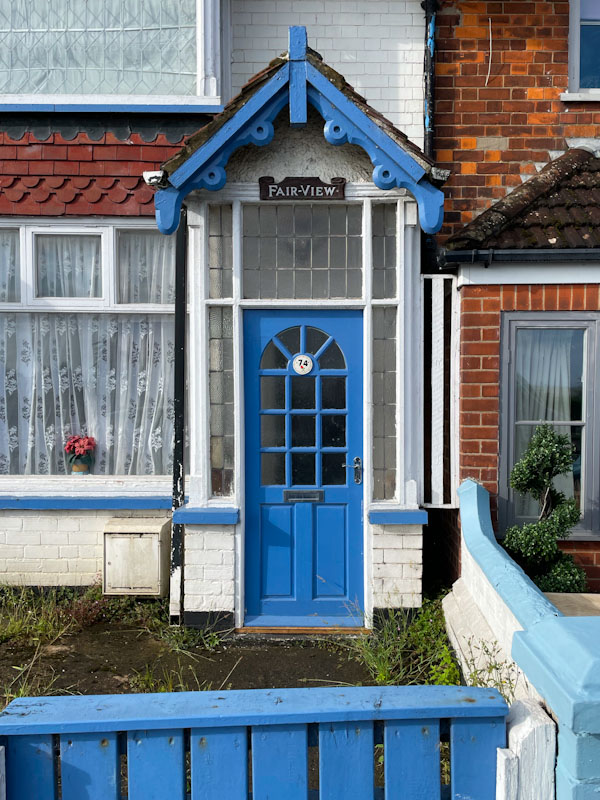Superb blue door and Victorian gable fronted porch, Cleethorpes, England, September 2023