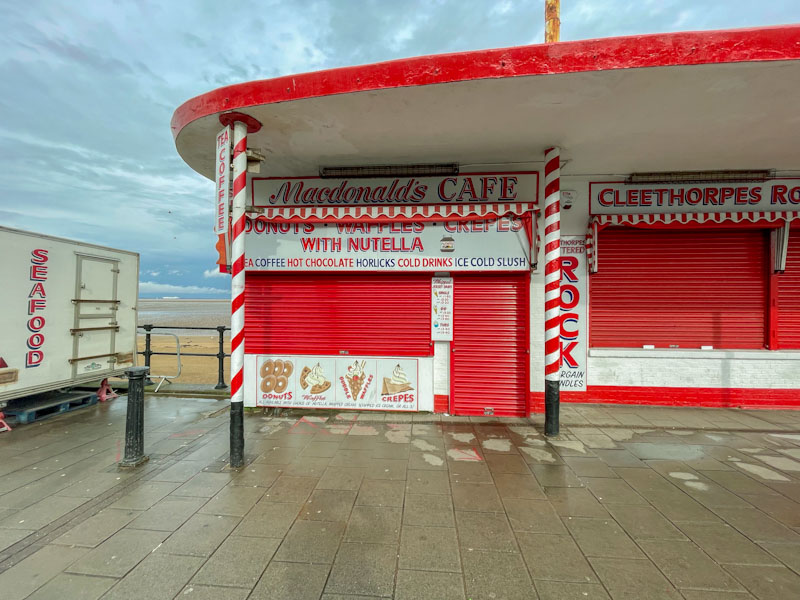 Classic seaside town beachfront food stall, shuttered up, Cleethorpes, England, September 2023