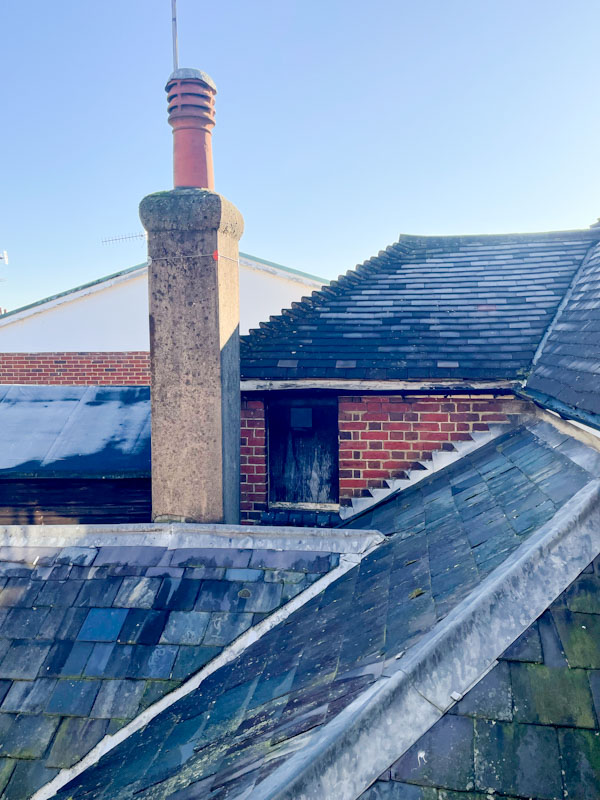 A roof door at The King's Arms and Royal Hotel, High Street, Godalming, Surrey, March 2025