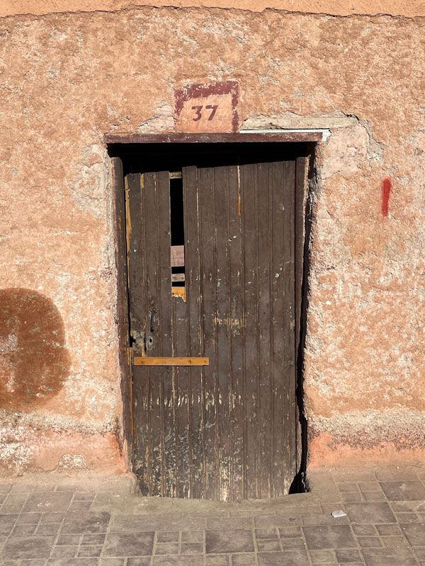 Tatty door at No 37, Derb Oualdidine, Marrakesh, Morocco, January 2025