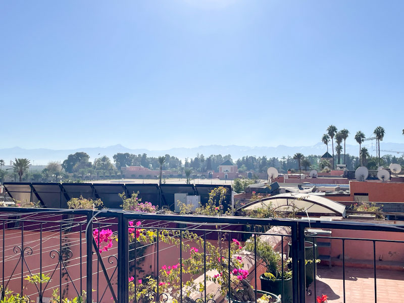 Roof garden view with the Atlas Mountains in the distance, Les Borjs del la Kasbah, Marrakesh, Morocco, January 2025