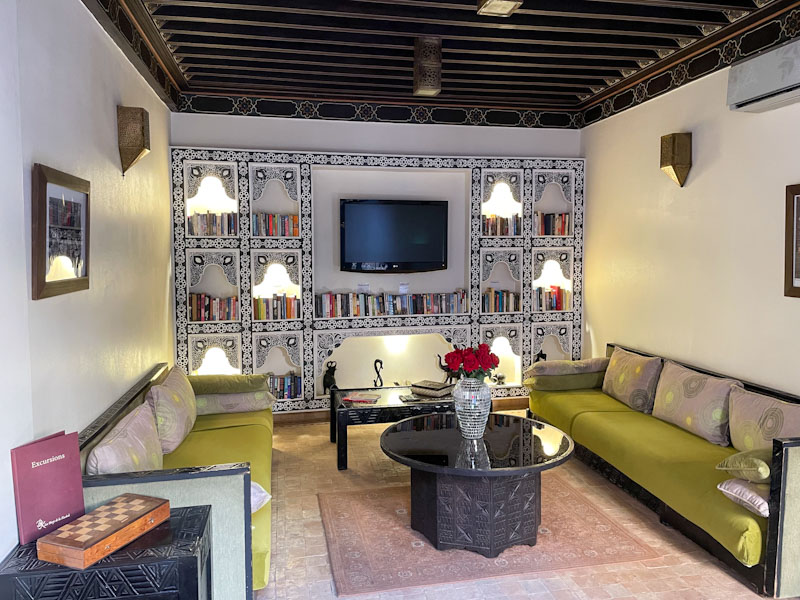 A third sitting room opening into the courtyard (ignore the TV, we did), Les Borjs del la Kasbah, Marrakesh, Morocco, January 2025