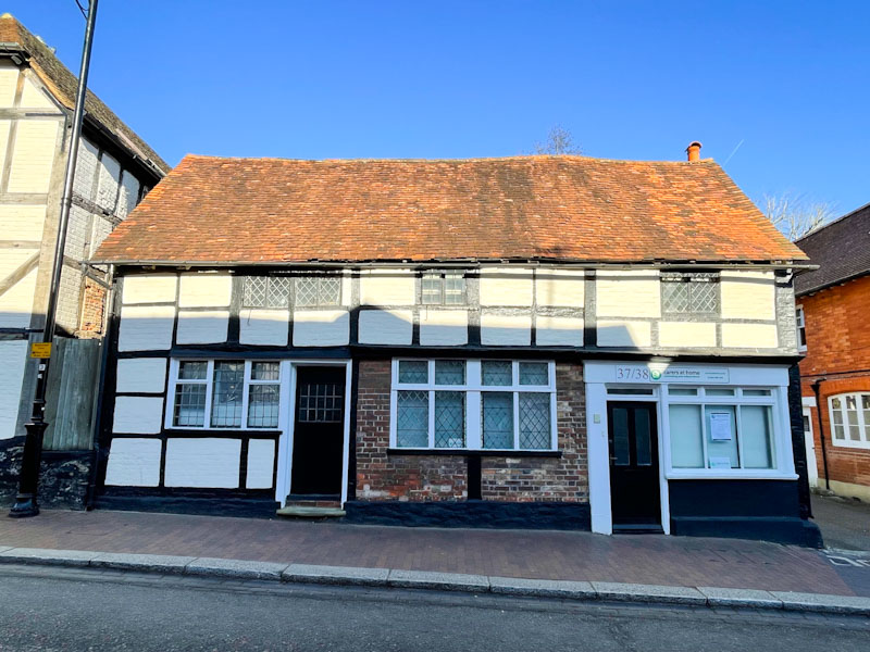 Two doors in a timber frame building, Bridge Street, Godalming, Surrey, March 2025