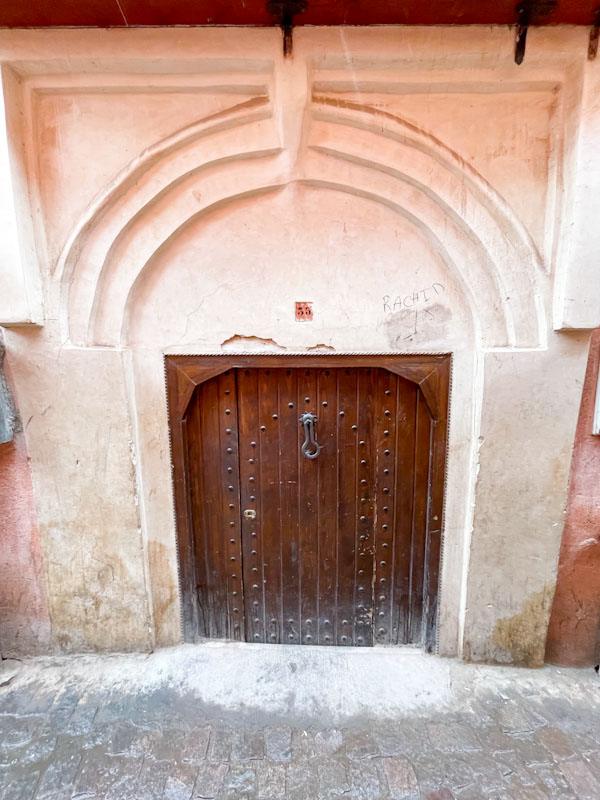 Large doorway, small door, Deer el Kheir, Marrakesh, Morocco, January 2025