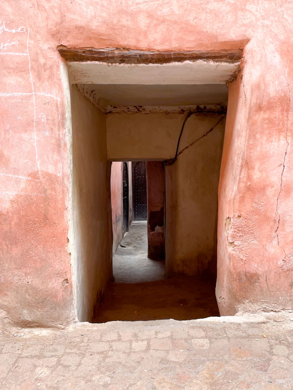 Narrow passageway leading to doors, Derb el Harrar, Marrakesh, Morocco, January 2025