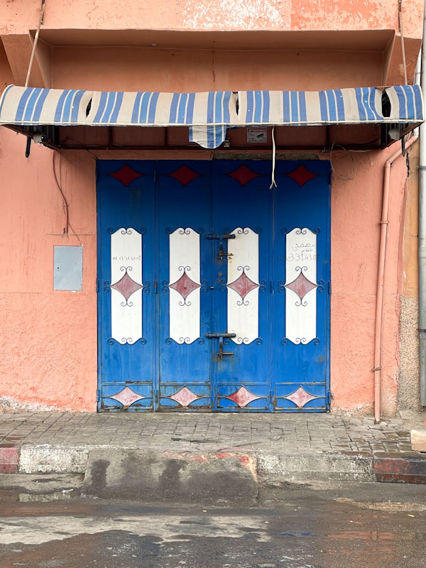 Folding shop doors, Taoulat el Miara, Marrakesh, Morocco, January 2025
