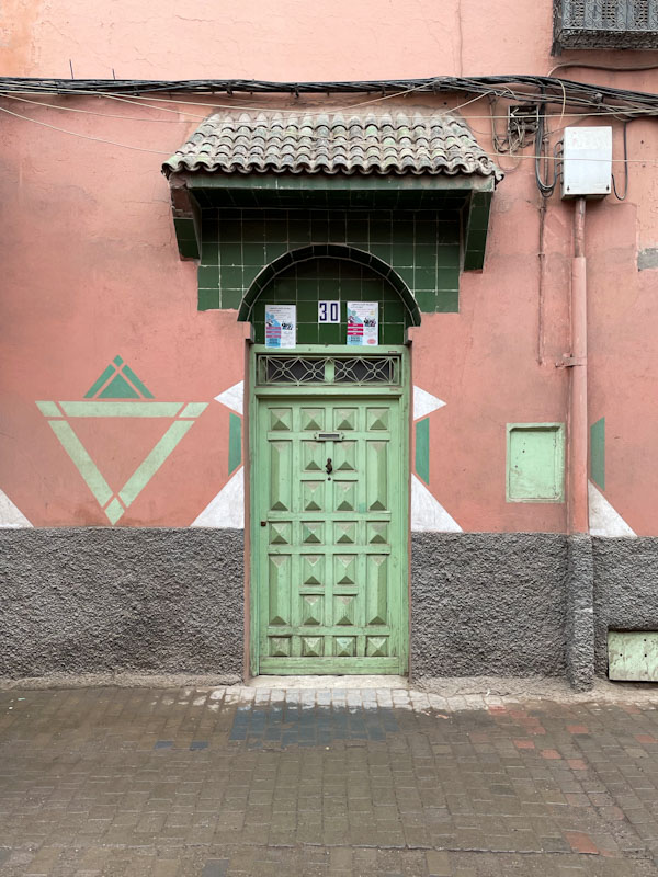 Stunning green panelled door and wall decorations to match, Trik Tikhizrit, Marrakesh, Morocco, January 2025