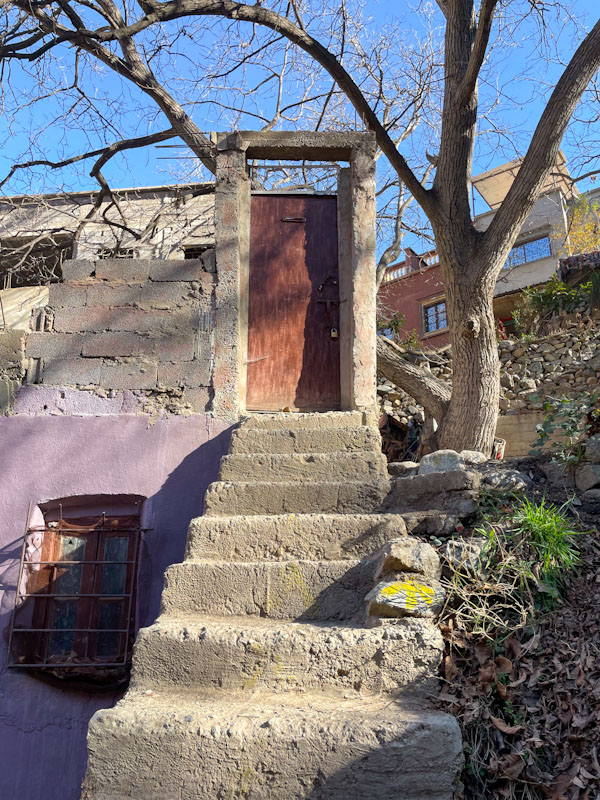 Outside door to a garden on the south side of the River Ourika in Sti Fadma, High Atlas, Morocco, January 2025