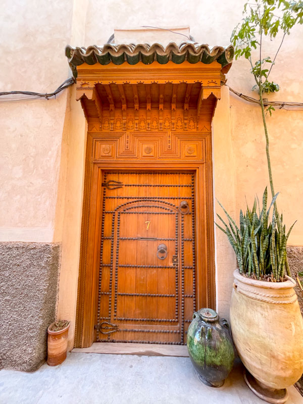 Stunning wooden frame and studded door within a door, Rue Riad Zitoun el Jedid, Marrakesh, January 2025