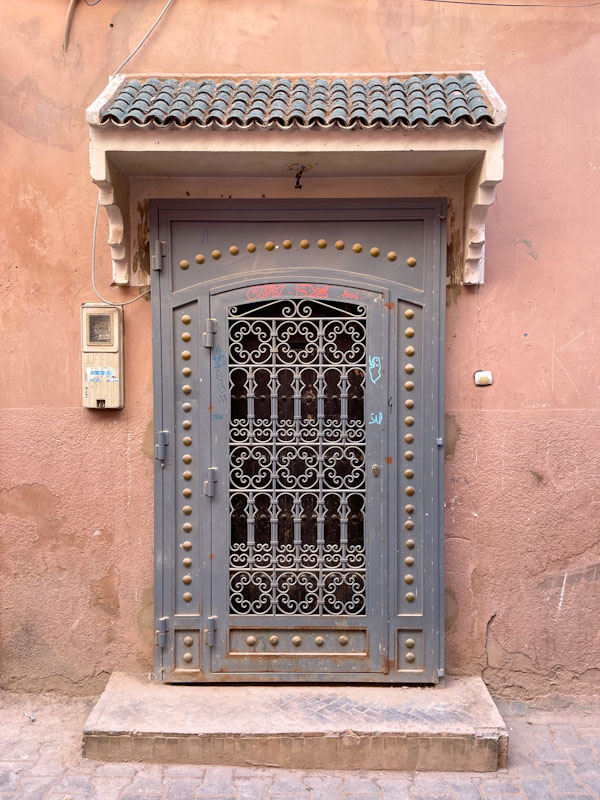 Intricate iron door within a door, Rue De La Bahia, Marrakesh, January 2025