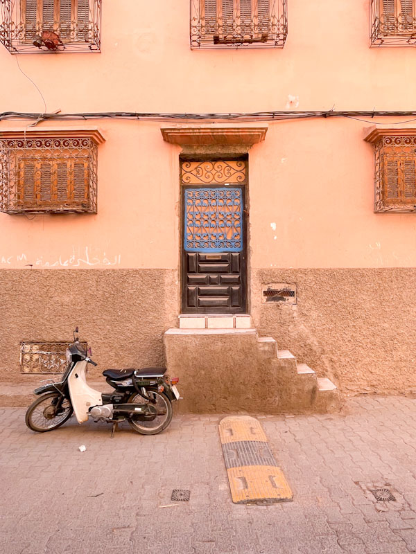 Steps door and a moped, Zankat Sidi Soussane, Marrakesh, Morocco, January 2025