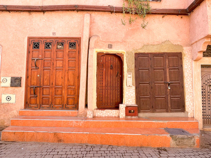 Three different wooden doors, Taoialety Issebtiyenne, Marrakesh, Morocco, January 2025